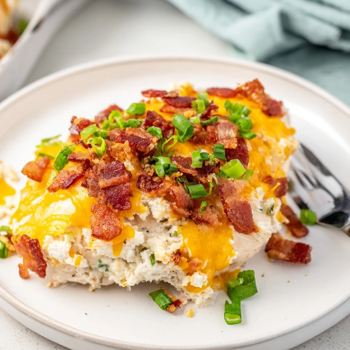 Creamy ranch chicken breasts bubbling with cheddar and crumbled bacon fresh from the oven